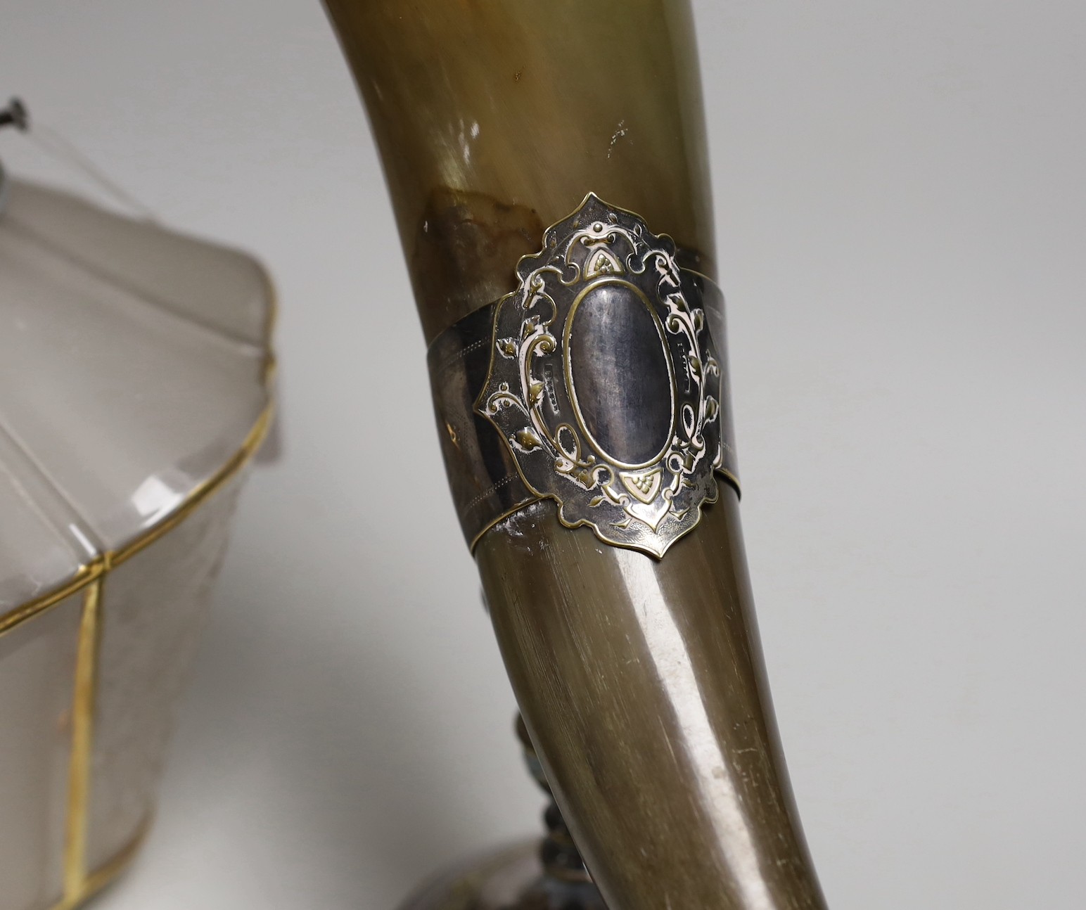 A silver plated and horn centrepiece and an Art Deco glass and chrome ceiling light